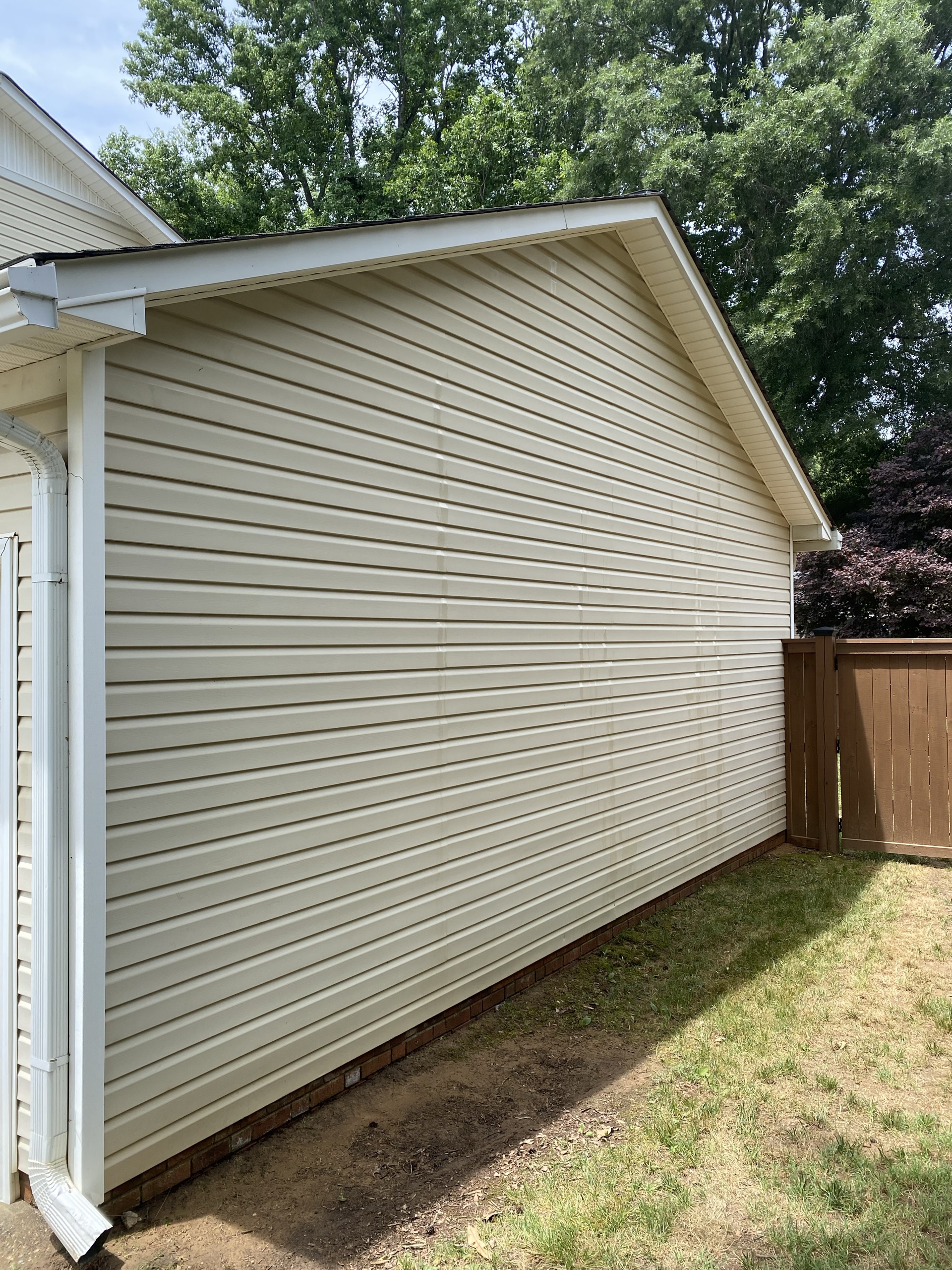 House siding after cleaning, clean and bright
